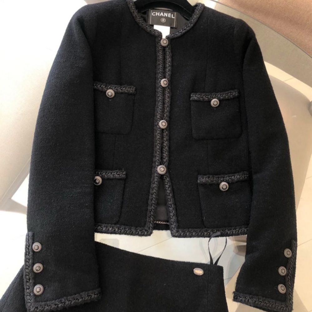 CHANEL Iconic La Petite Veste Noire Wool Black Two Piece Set - Jacket and skirt.